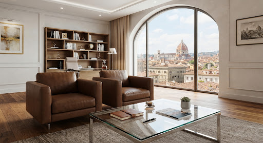 A modern office interior with leather armchairs and a glass table, a large window overlooking a historic European skyline with a domed basilica.